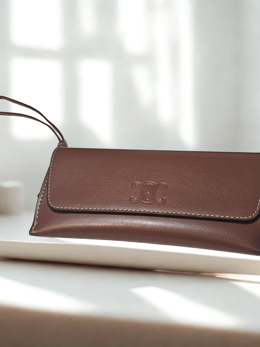 Celine Chocolate Brown Leather Wristlet with Embossed Logo/Case Empty/New/MSRP45